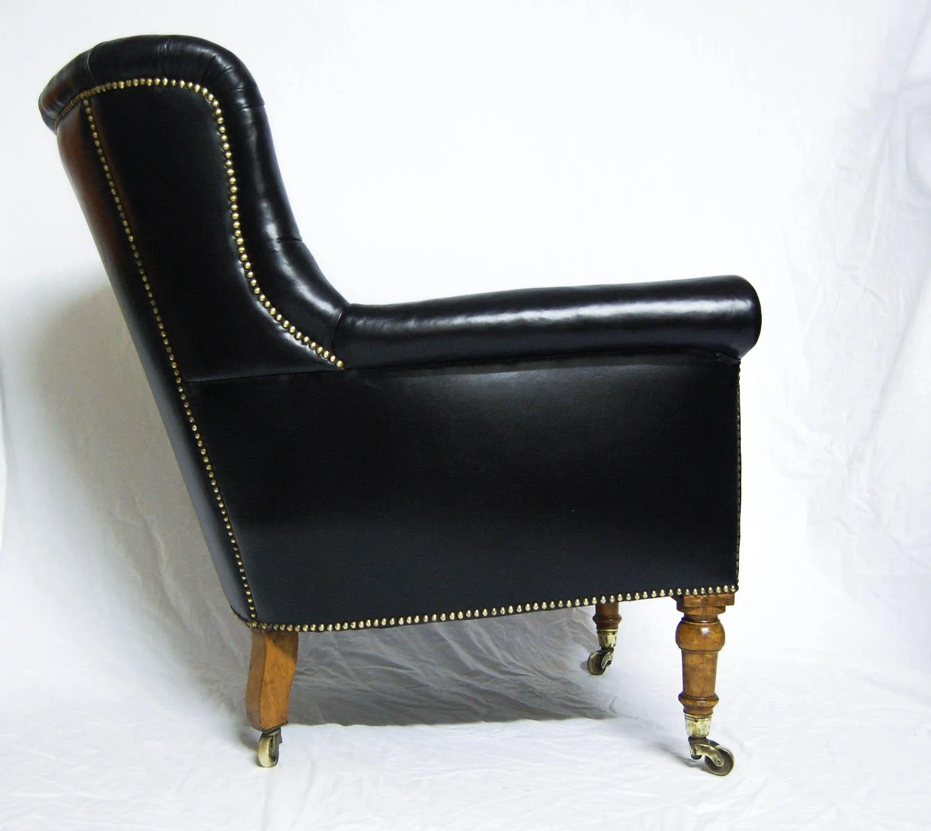 A Rare Pair of Early Victorian Bergere Library Chairs by Holland & Sons