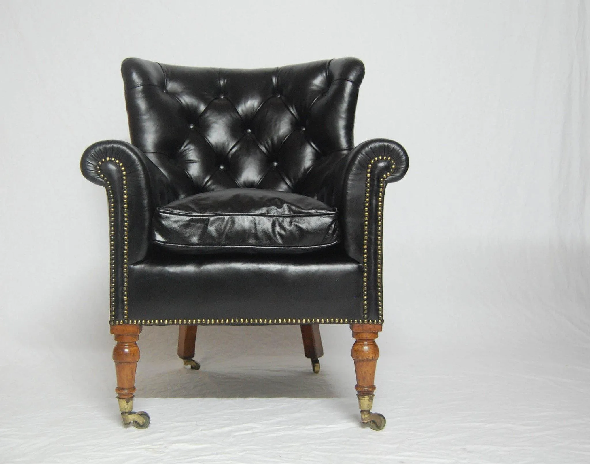 A Rare Pair of Early Victorian Bergere Library Chairs by Holland & Sons