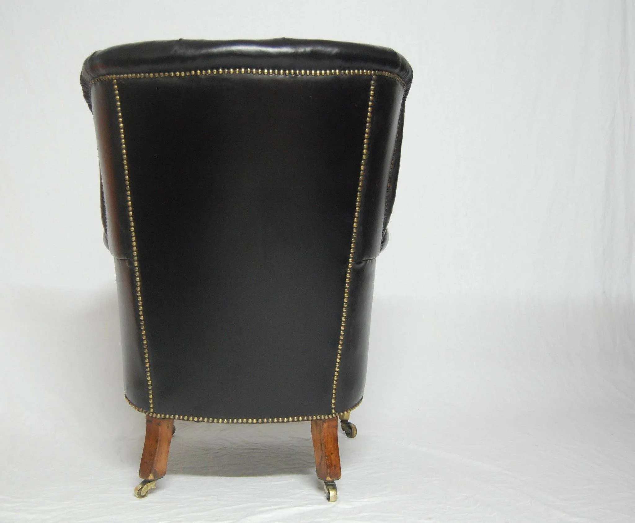 A Rare Pair of Early Victorian Bergere Library Chairs by Holland & Sons