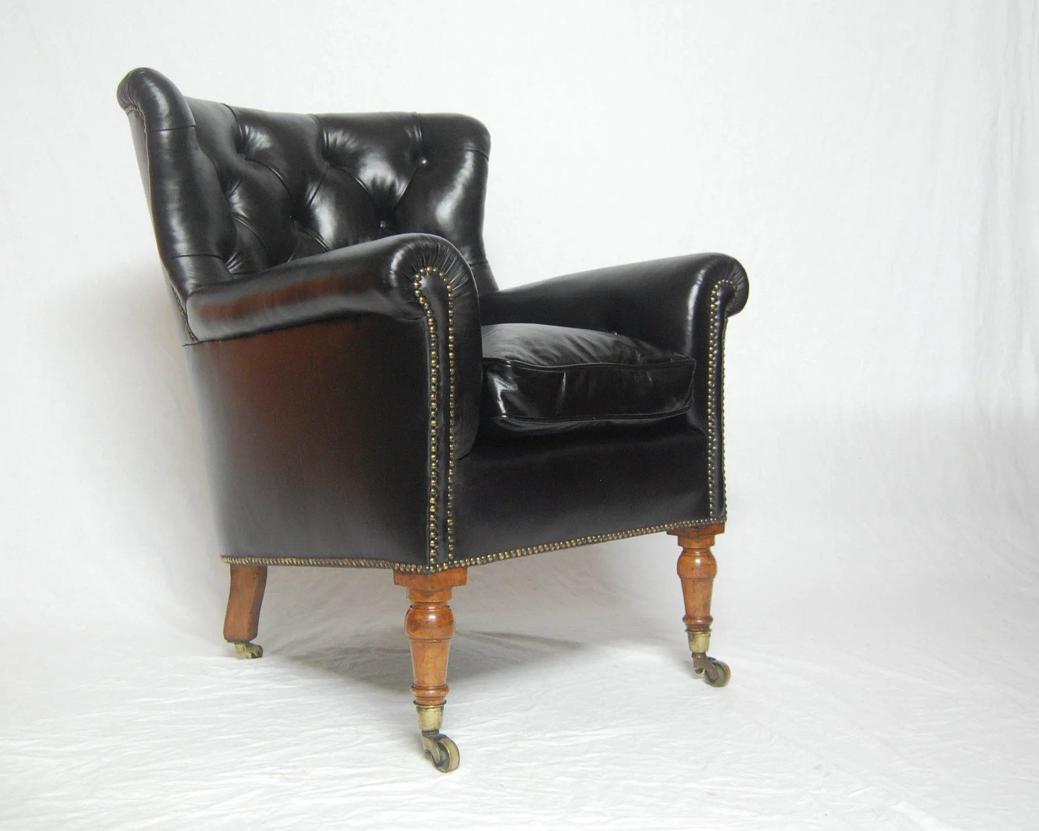 A Rare Pair of Early Victorian Bergere Library Chairs by Holland & Sons
