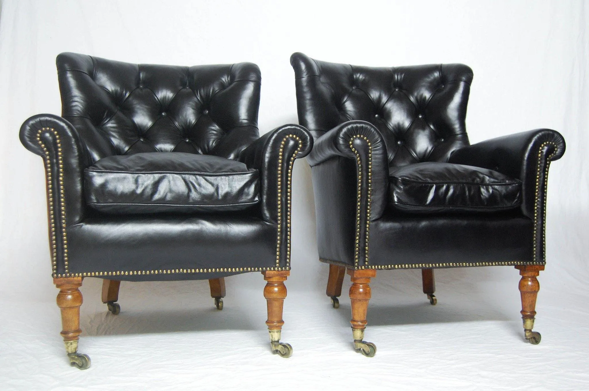 A Rare Pair of Early Victorian Bergere Library Chairs by Holland & Sons